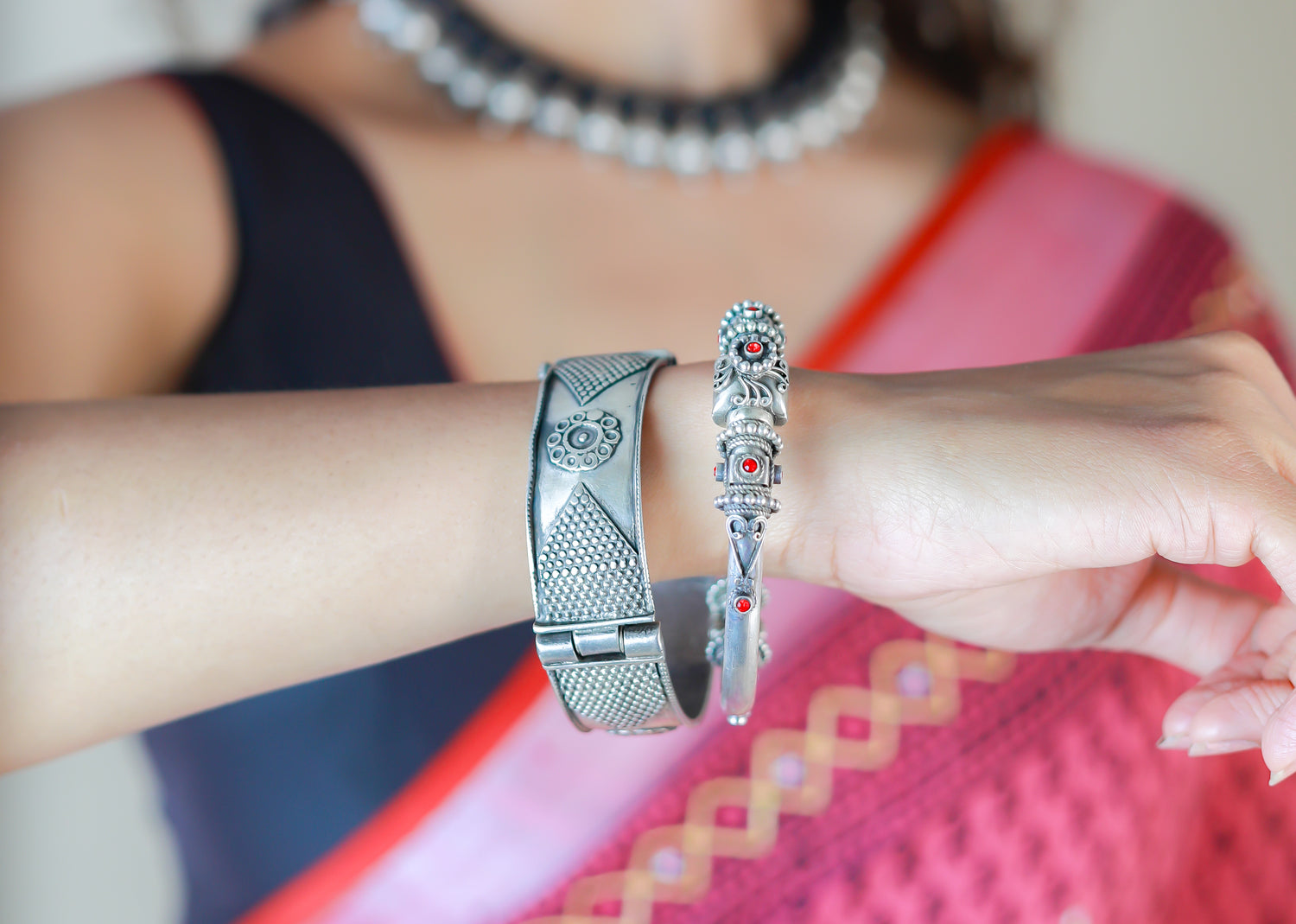 Explore our captivating collection of Sterling Silver Kada Bangles and Bracelets, where timeless beauty meets intricate craftsmanship. Each piece is a fusion of elegance and tradition, designed to adorn your wrists with grace.